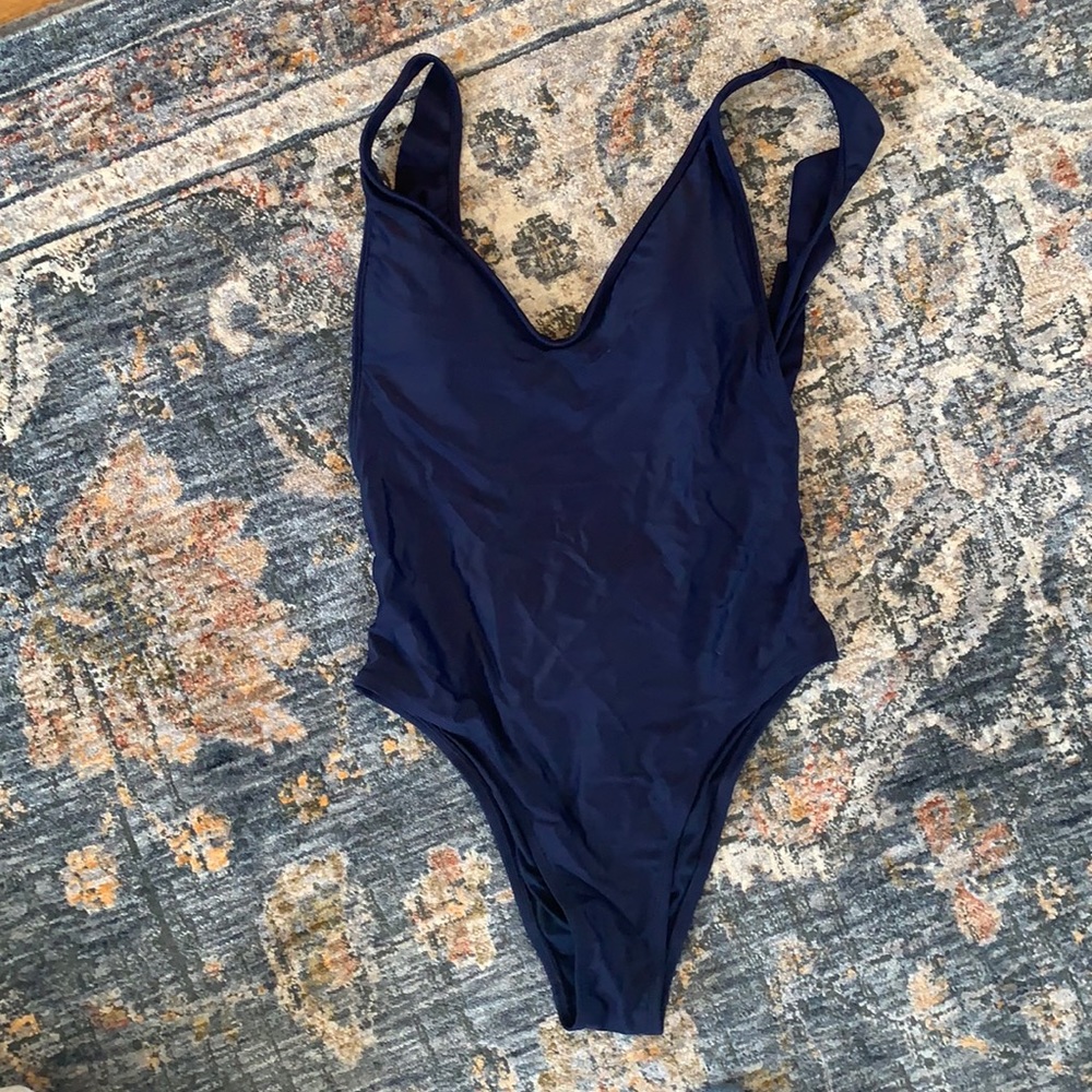 Aerie baby one piece bathing suit with open back and ruffles